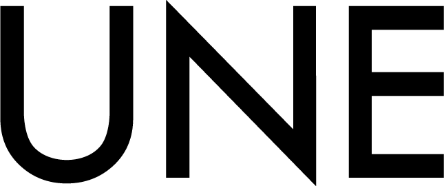 UNE